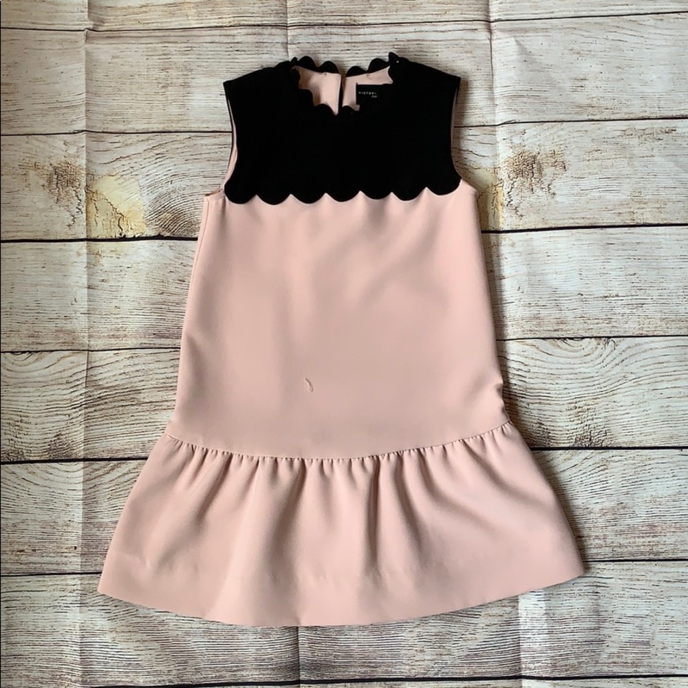 Girl’s pink and black dress